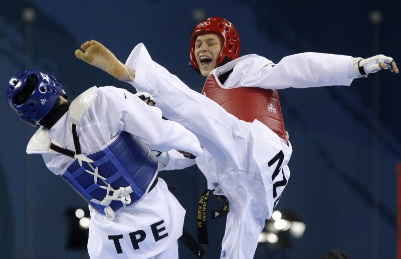 Logan Campbell (desno) med olimpijskim nastopom.